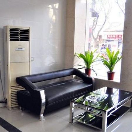 Aoqi Business Hotel Canton Esterno foto