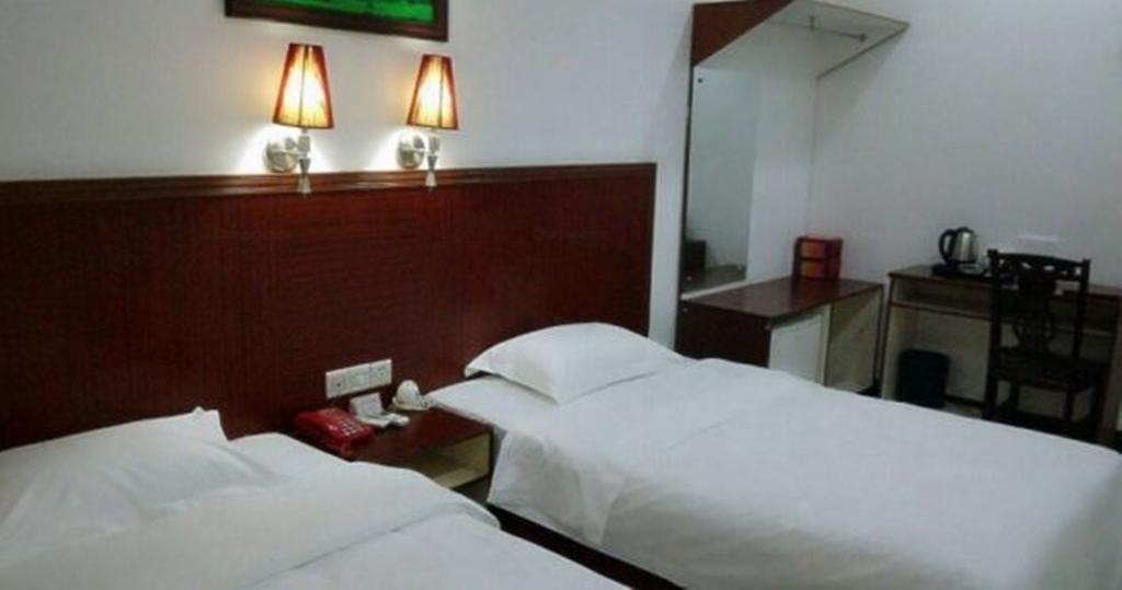 Aoqi Business Hotel Canton Esterno foto