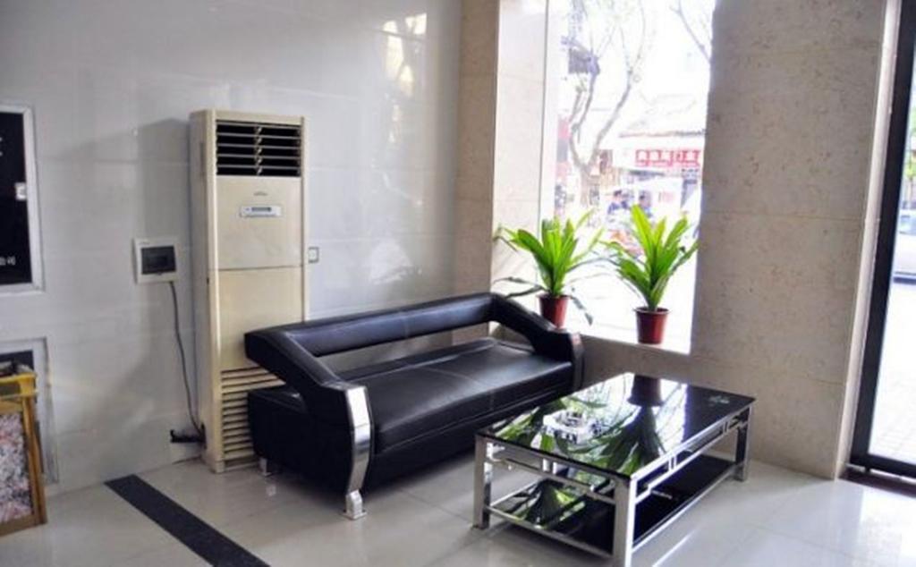 Aoqi Business Hotel Canton Esterno foto
