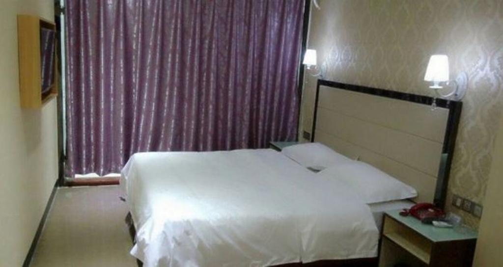 Aoqi Business Hotel Canton Esterno foto