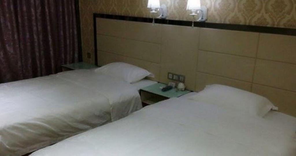 Aoqi Business Hotel Canton Esterno foto