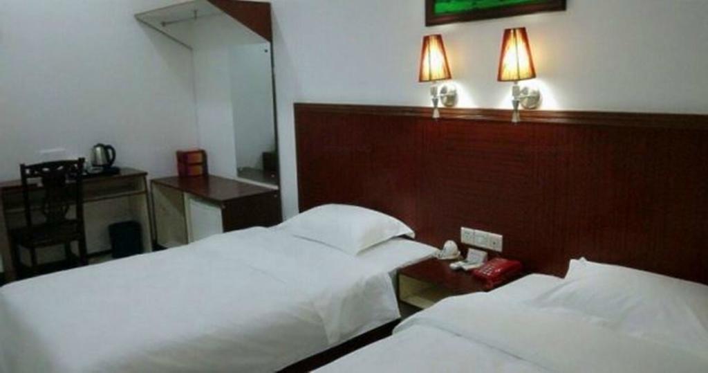 Aoqi Business Hotel Canton Esterno foto