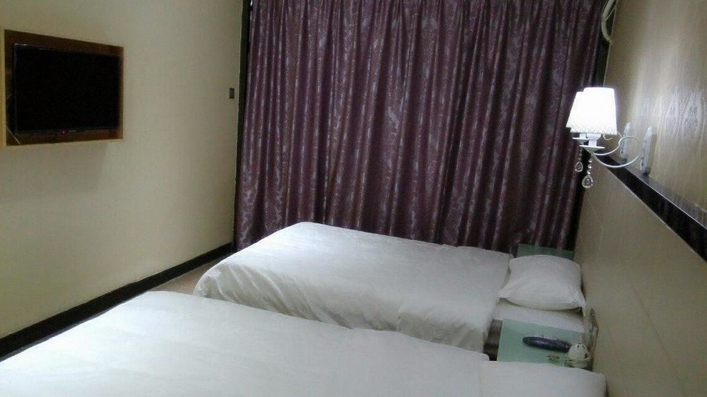 Aoqi Business Hotel Canton Esterno foto