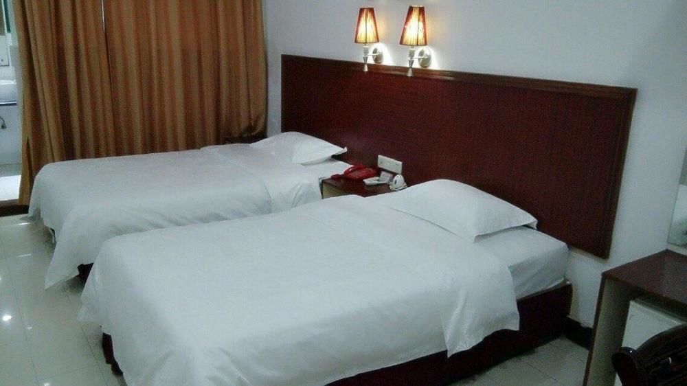 Aoqi Business Hotel Canton Esterno foto